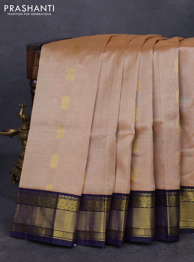 Kuppadam silk cotton saree sandal and dark blue with zari woven paisley buttas and zari woven border