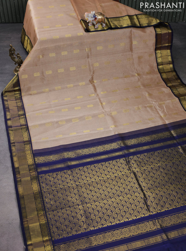 Kuppadam silk cotton saree sandal and dark blue with zari woven paisley buttas and zari woven border