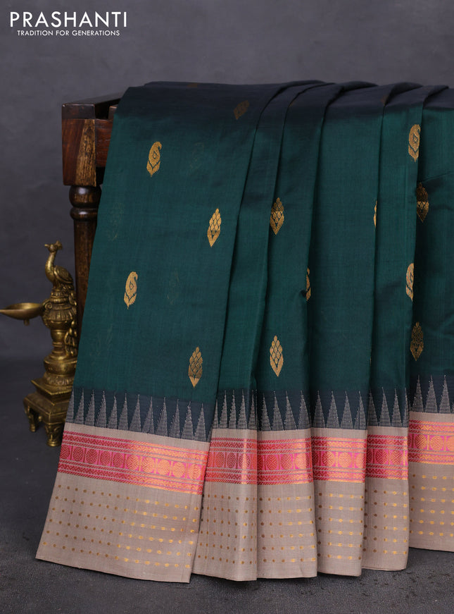 Kuppadam silk cotton saree bottle green and grey shade with zari woven buttas and temple design zari woven border