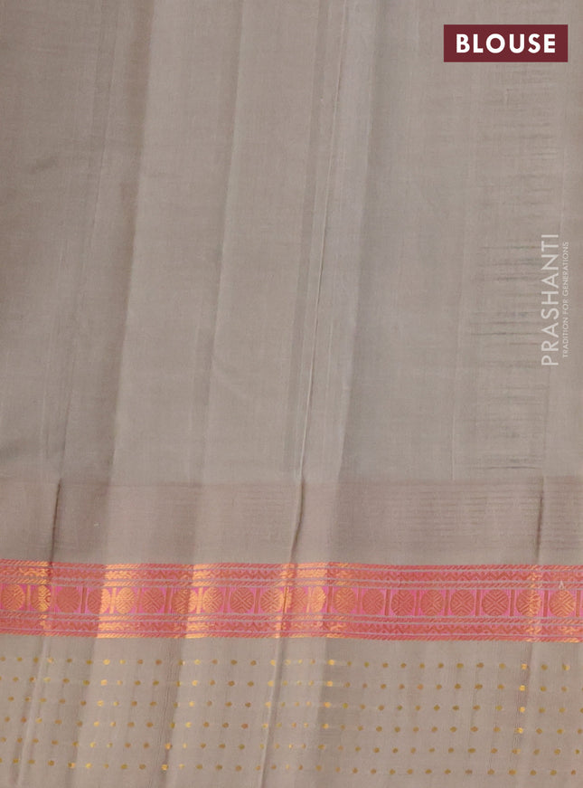 Kuppadam silk cotton saree bottle green and grey shade with zari woven buttas and temple design zari woven border