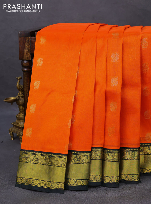 Kuppadam silk cotton saree orange and bottle green with zari woven paisley buttas and zari woven border