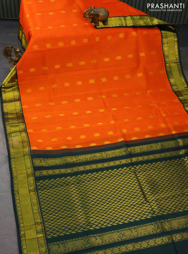Kuppadam silk cotton saree orange and bottle green with zari woven paisley buttas and zari woven border