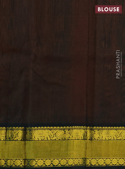 Kuppadam silk cotton saree orange and bottle green with zari woven paisley buttas and zari woven border