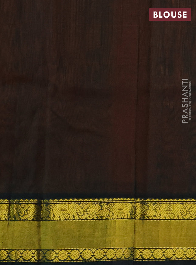 Kuppadam silk cotton saree orange and bottle green with zari woven paisley buttas and zari woven border