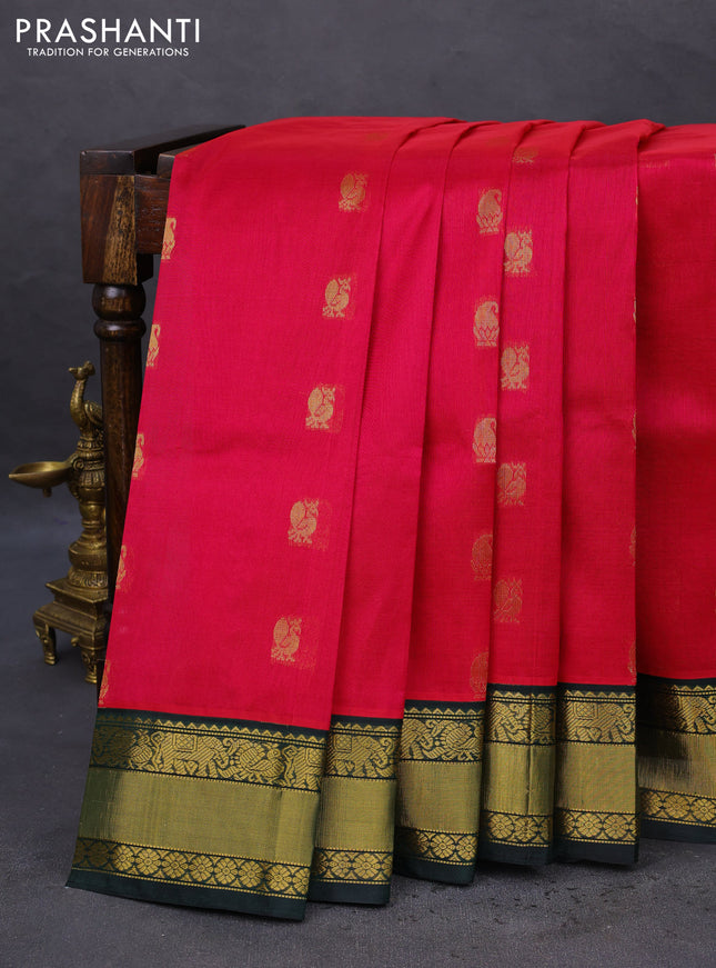 Kuppadam silk cotton saree dark pink and bottle green with zari woven paisley buttas and zari woven border