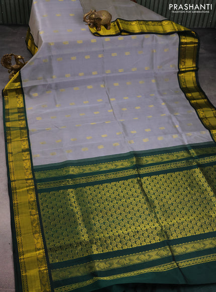 Kuppadam silk cotton saree grey and bottle green with annam zari woven buttas and zari woven border