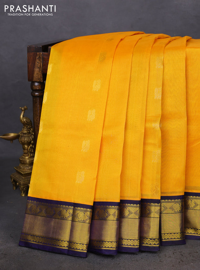 Kuppadam silk cotton saree mango yellow and navy blue with annam zari woven buttas and zari woven border