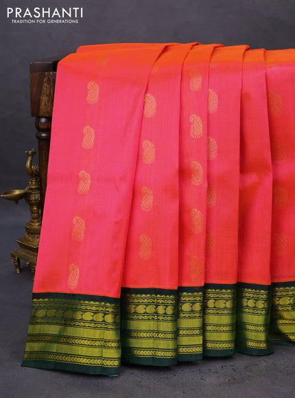 Kuppadam silk cotton saree peach pink and dark green with zari woven paisley buttas and zari woven border