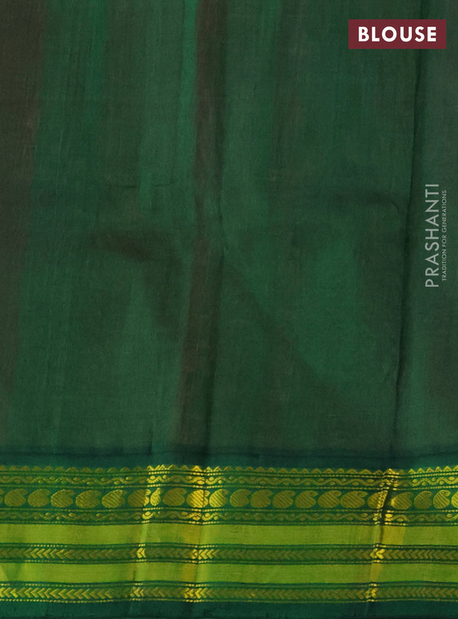 Kuppadam silk cotton saree peach pink and dark green with zari woven paisley buttas and zari woven border