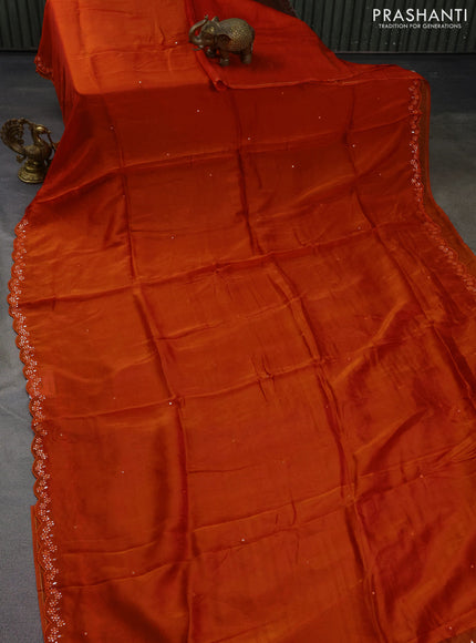 Satin crepe silk saree orange and beige with mirror work and ajrakh printed blouse