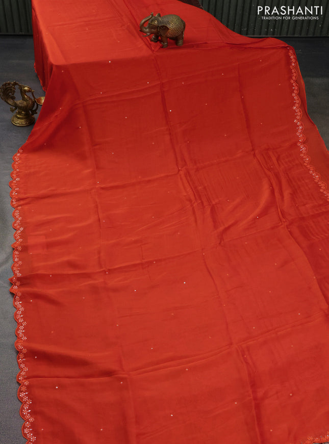 Satin crepe silk saree orange and beige with mirror work and ajrakh printed blouse