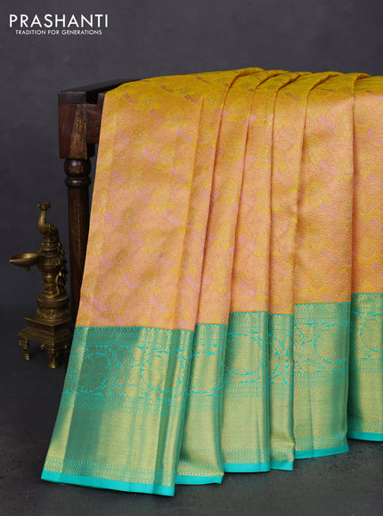 Pure kanchipuram silk saree sandal and teal green with allover zari woven brocade weaves and zari woven border