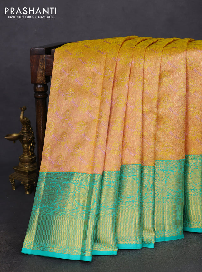 Pure kanchipuram silk saree sandal and teal green with allover zari woven brocade weaves and zari woven border