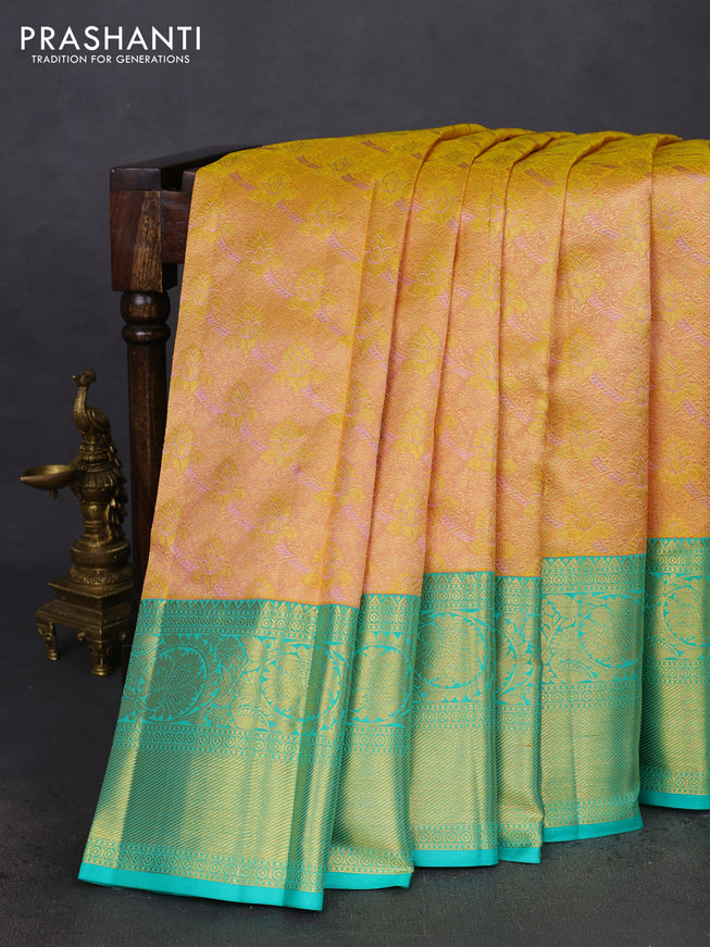 Pure kanchipuram silk saree sandal and teal green with allover zari woven brocade weaves and zari woven border
