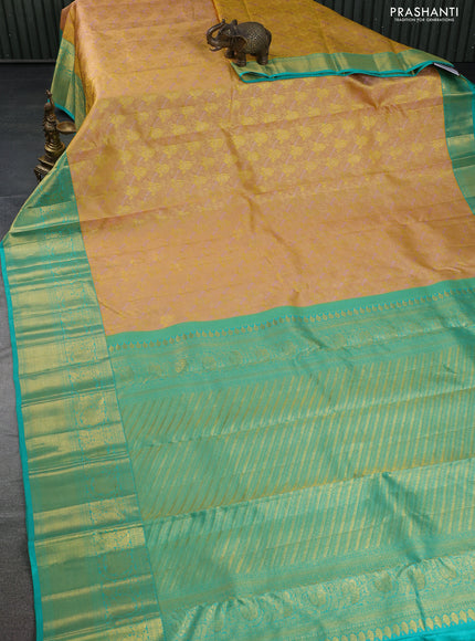Pure kanchipuram silk saree sandal and teal green with allover zari woven brocade weaves and zari woven border
