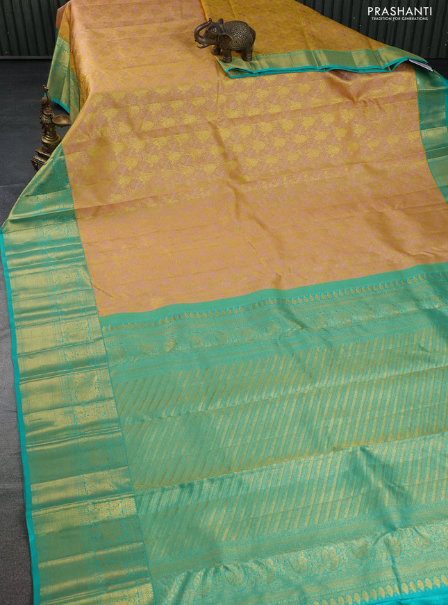 Pure kanchipuram silk saree sandal and teal green with allover zari woven brocade weaves and zari woven border