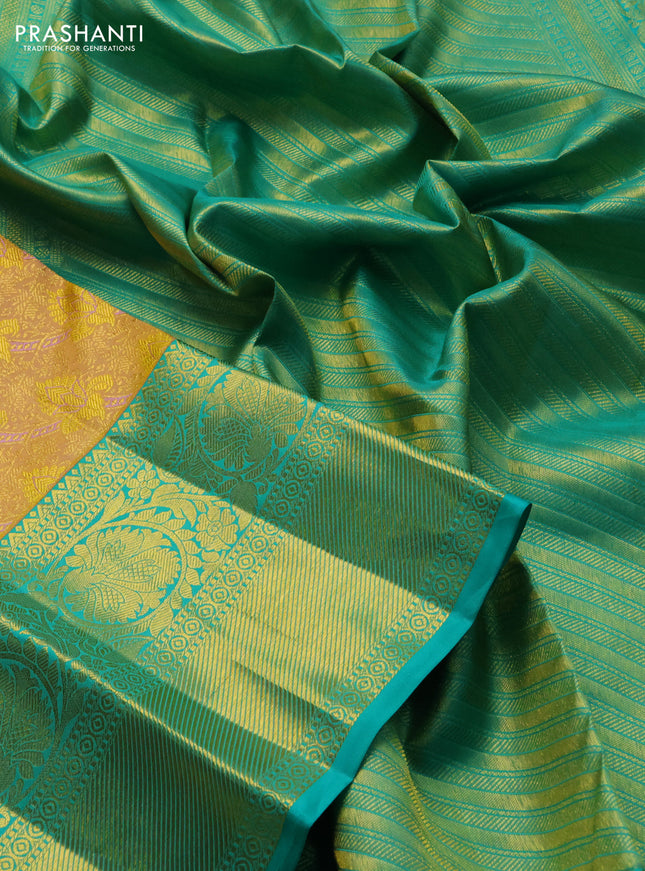 Pure kanchipuram silk saree sandal and teal green with allover zari woven brocade weaves and zari woven border