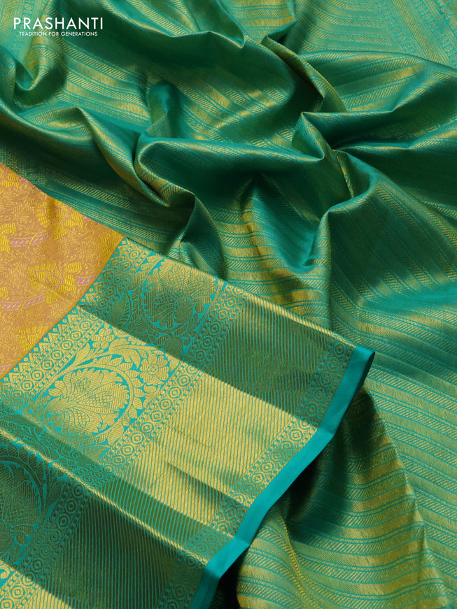 Pure kanchipuram silk saree sandal and teal green with allover zari woven brocade weaves and zari woven border