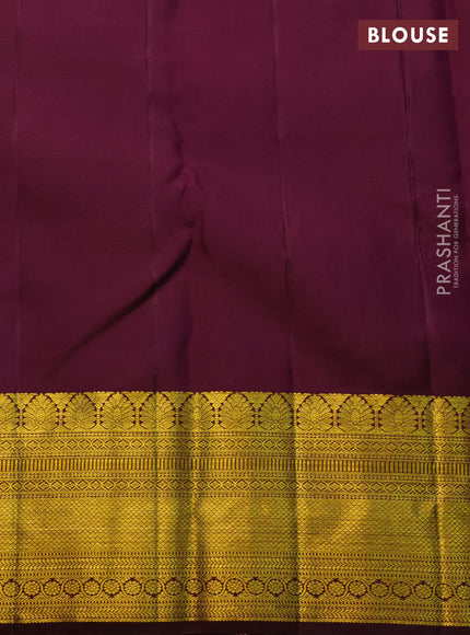 Pure kanchipuram silk saree cream and deep wine shade with allover zari woven brocade weaves and zari woven border