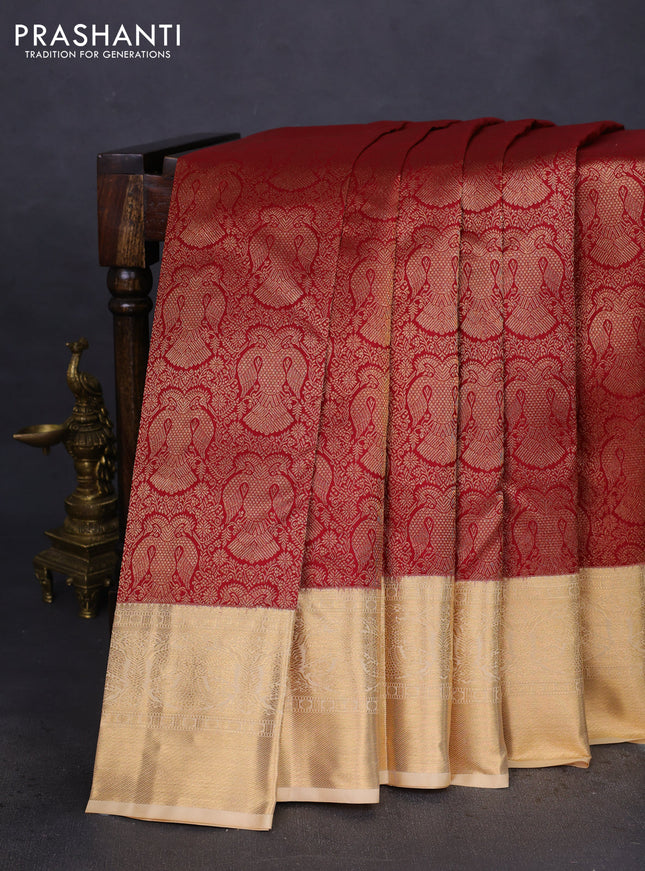 Pure kanchipuram silk saree maroon and sandal with allover zari woven brocade weaves and zari woven border