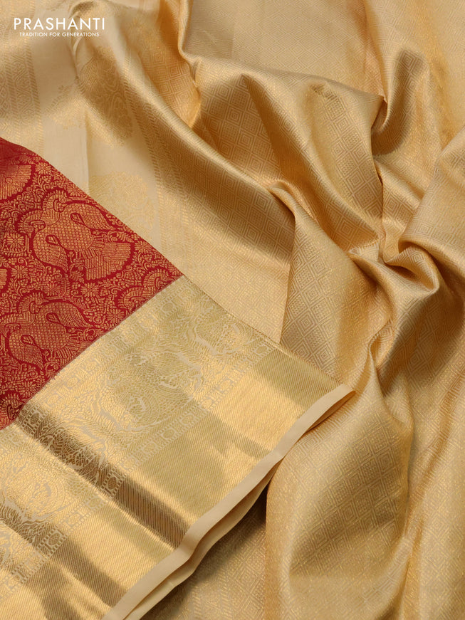 Pure kanchipuram silk saree maroon and sandal with allover zari woven brocade weaves and zari woven border