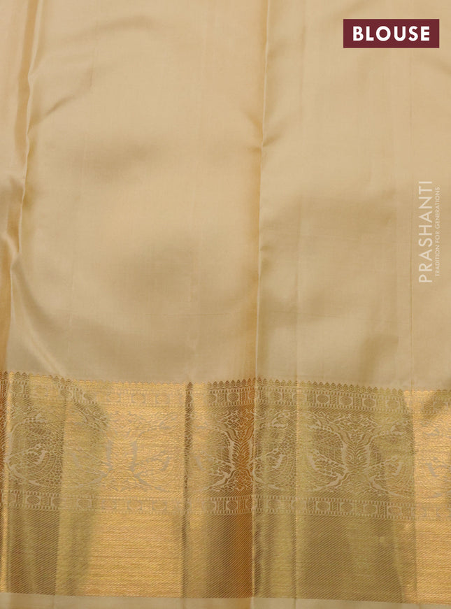 Pure kanchipuram silk saree maroon and sandal with allover zari woven brocade weaves and zari woven border