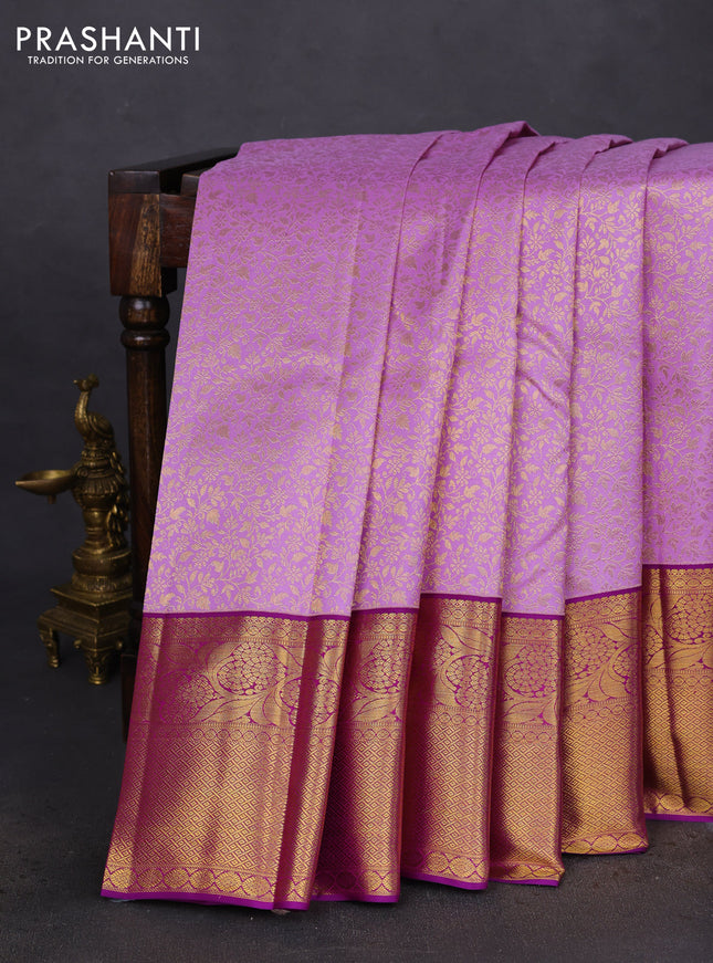 Pure kanchipuram silk saree lavender and purple with allover zari woven brocade weaves and zari woven border