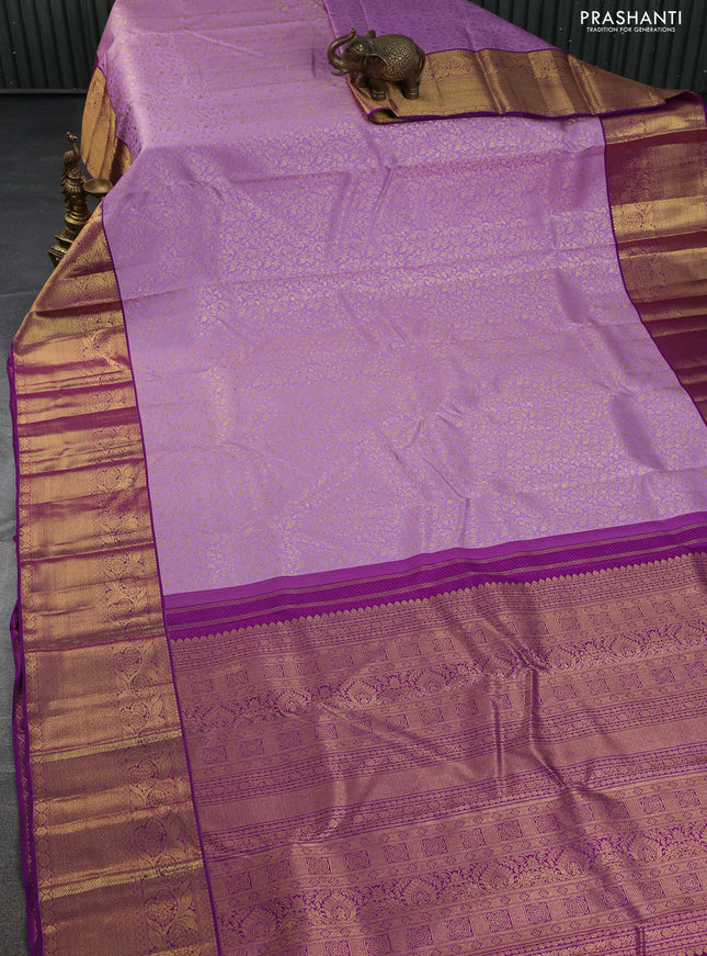 Pure kanchipuram silk saree lavender and purple with allover zari woven brocade weaves and zari woven border