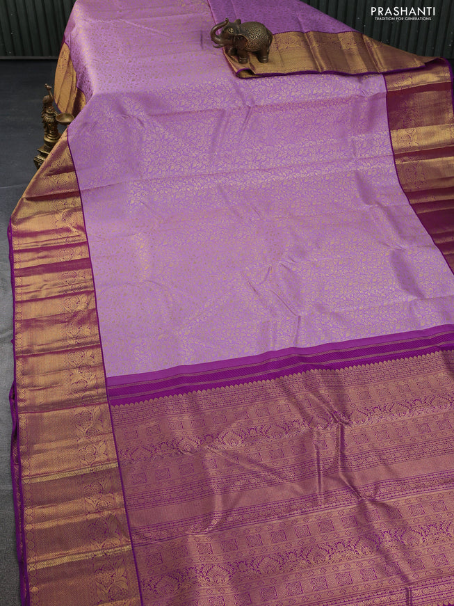 Pure kanchipuram silk saree lavender and purple with allover zari woven brocade weaves and zari woven border
