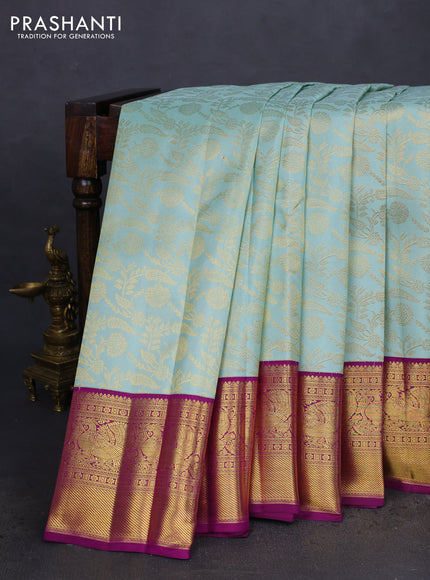 Pure kanchipuram silk saree pastel blue and purple with allover zari woven brocade weaves and zari woven border