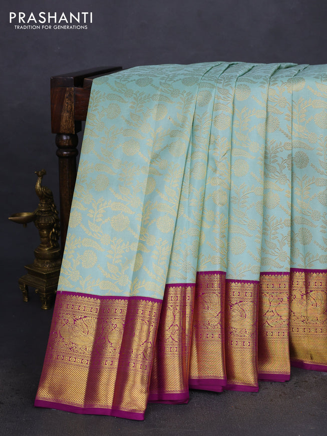 Pure kanchipuram silk saree pastel blue and purple with allover zari woven brocade weaves and zari woven border