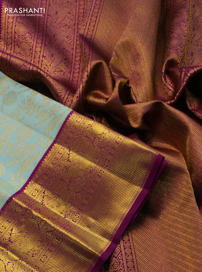 Pure kanchipuram silk saree pastel blue and purple with allover zari woven brocade weaves and zari woven border