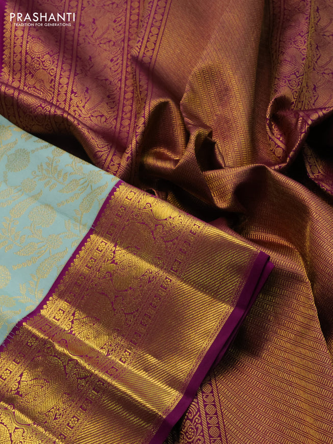 Pure kanchipuram silk saree pastel blue and purple with allover zari woven brocade weaves and zari woven border