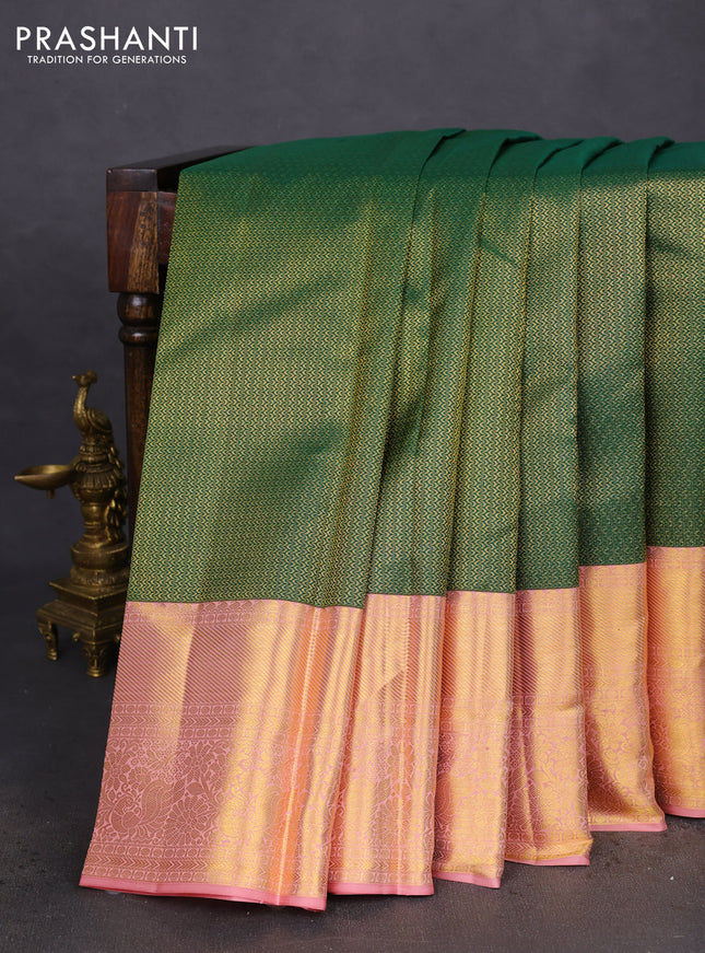 Pure kanchipuram silk saree green and peach shade with allover zari woven brocade weaves and zari woven border