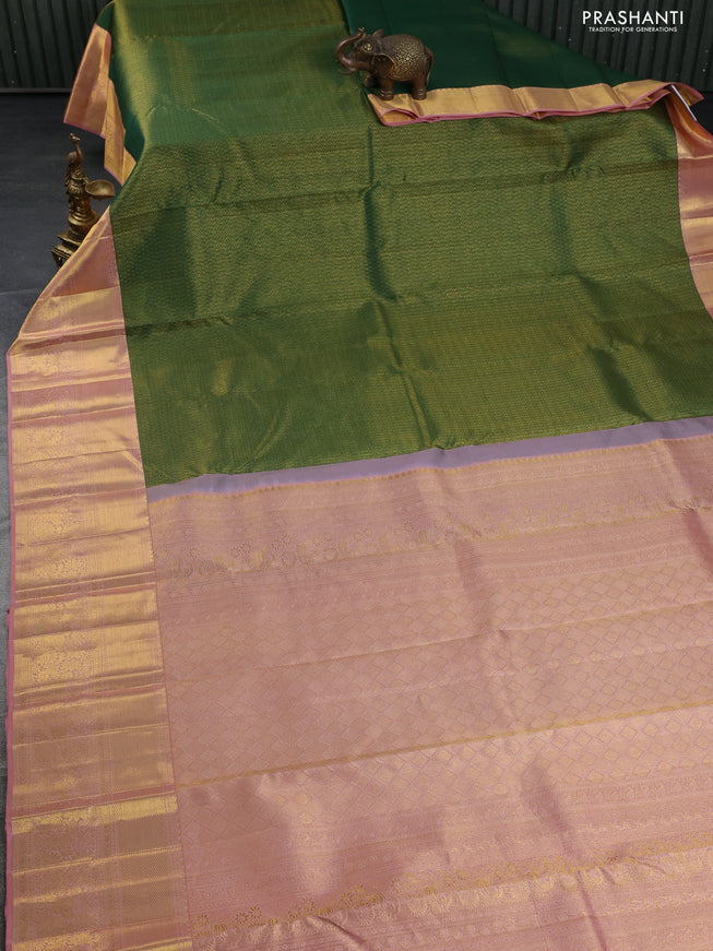 Pure kanchipuram silk saree green and peach shade with allover zari woven brocade weaves and zari woven border