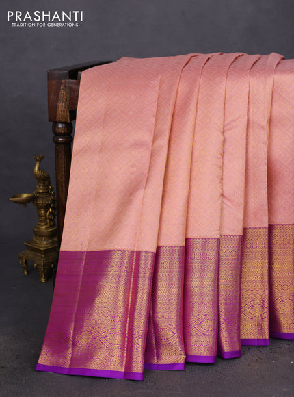 Pure kanchipuram silk saree peach shade and purple with allover zari woven brocade weaves and zari woven border