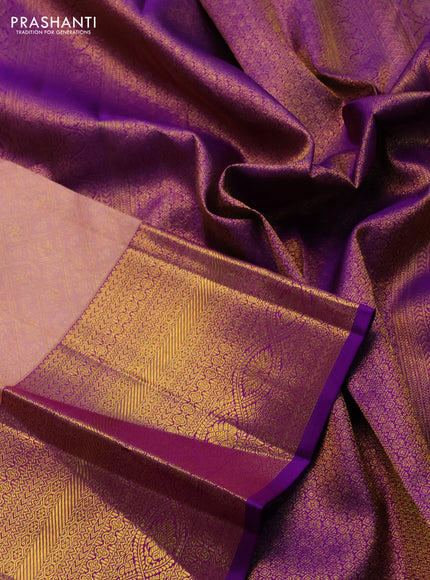 Pure kanchipuram silk saree peach shade and purple with allover zari woven brocade weaves and zari woven border