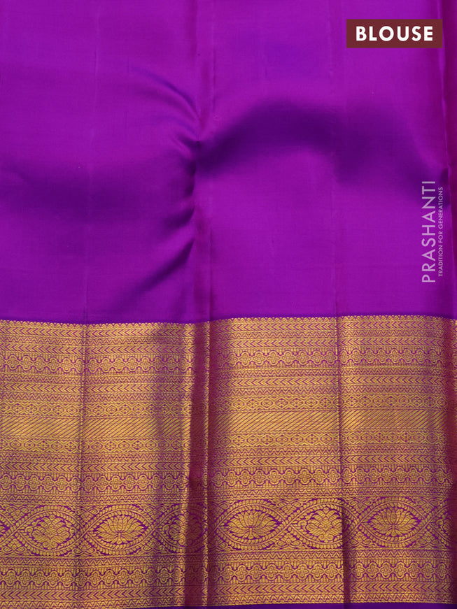 Pure kanchipuram silk saree peach shade and purple with allover zari woven brocade weaves and zari woven border