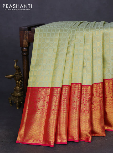 Pure kanchipuram silk saree pista green and pink with allover zari woven brocade weaves and long zari woven border