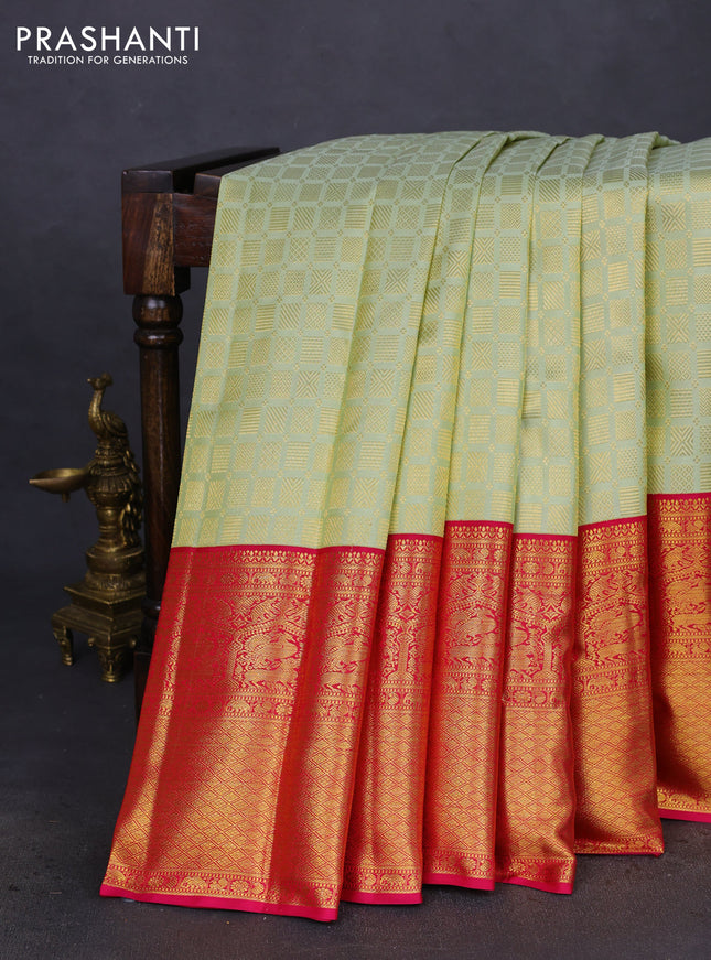 Pure kanchipuram silk saree pista green and pink with allover zari woven brocade weaves and long zari woven border