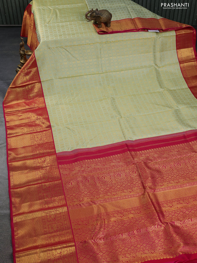 Pure kanchipuram silk saree pista green and pink with allover zari woven brocade weaves and long zari woven border