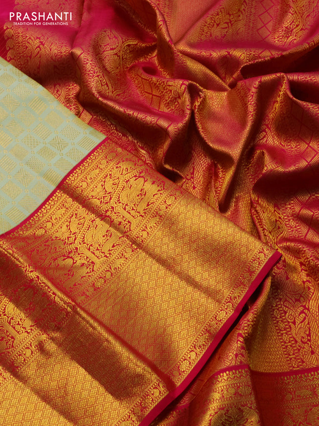 Pure kanchipuram silk saree pista green and pink with allover zari woven brocade weaves and long zari woven border