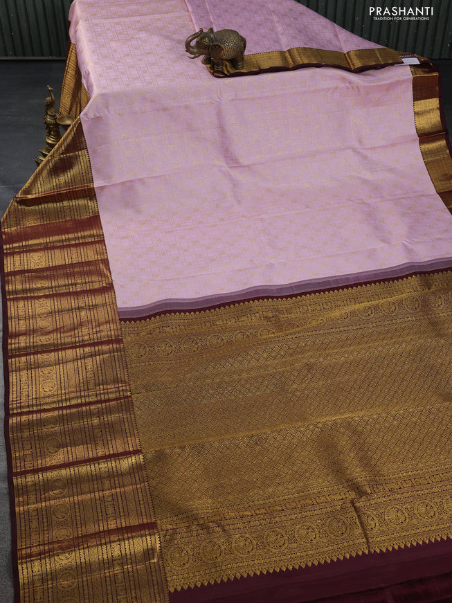 Pure kanchipuram silk saree pastel pink and brown with allover zari checks & buttas and long zari woven border