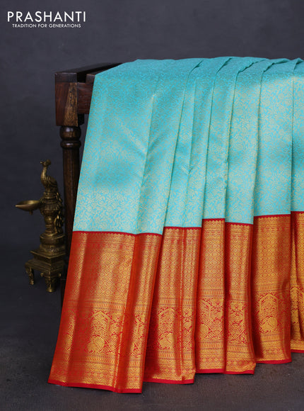 Pure kanchipuram silk saree teal blue and red with allover zari woven brocade weaves and long zari woven border