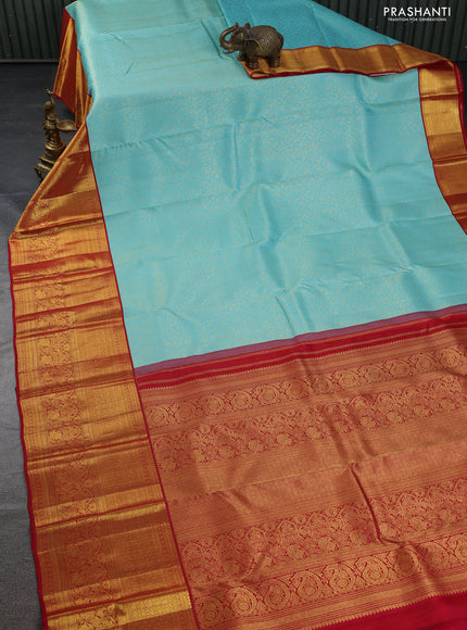 Pure kanchipuram silk saree teal blue and red with allover zari woven brocade weaves and long zari woven border