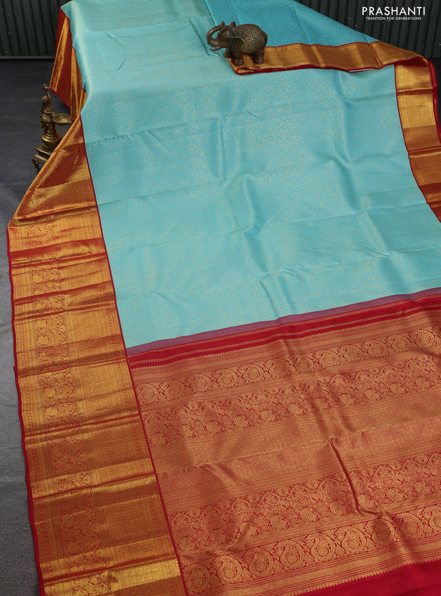 Pure kanchipuram silk saree teal blue and red with allover zari woven brocade weaves and long zari woven border