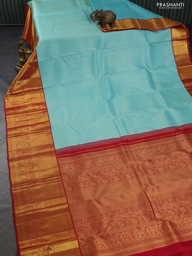 Pure kanchipuram silk saree teal blue and red with allover zari woven brocade weaves and long zari woven border