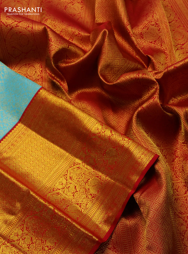 Pure kanchipuram silk saree teal blue and red with allover zari woven brocade weaves and long zari woven border