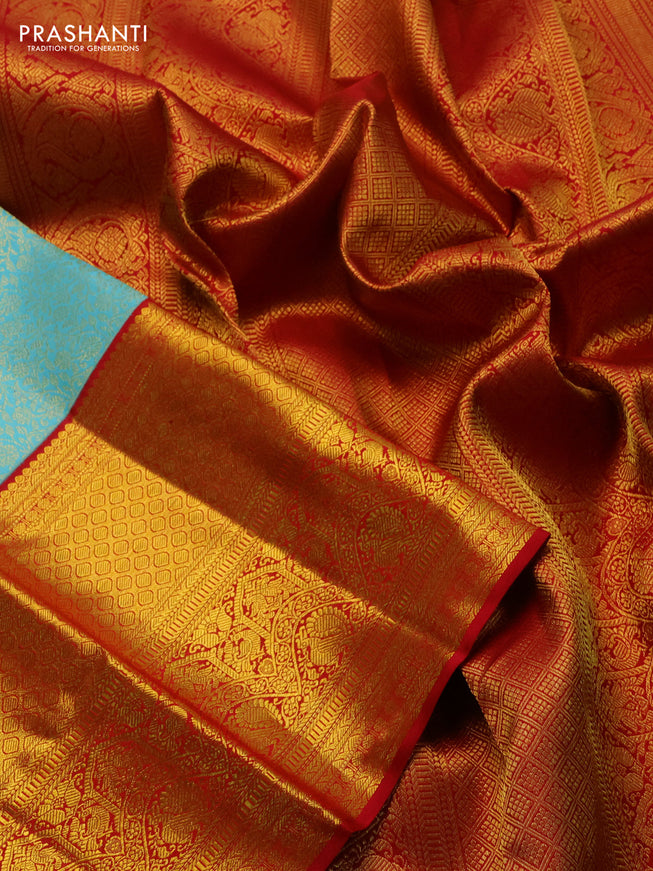 Pure kanchipuram silk saree teal blue and red with allover zari woven brocade weaves and long zari woven border