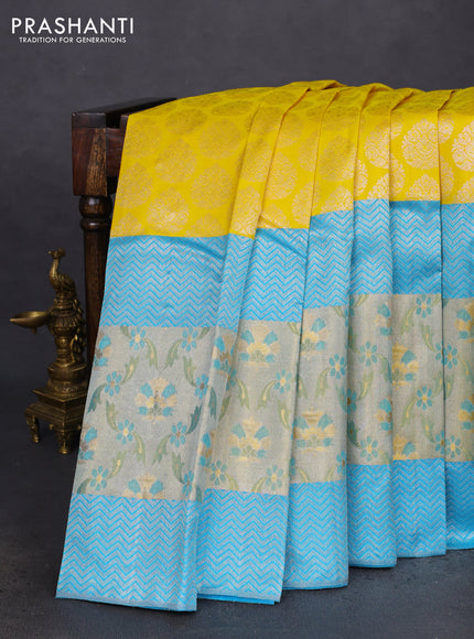 Pure kanchipuram silk saree yellow and teal blue with silver zari woven buttas and long rich zari woven border